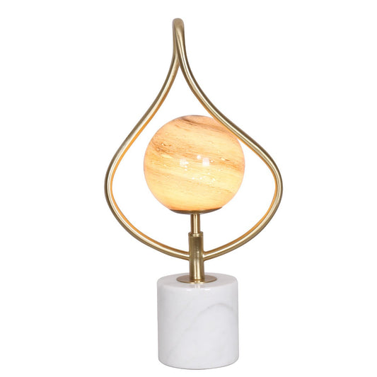 Image of sarantino sculptural orange glass table lamp with white marble base  ideal for luxury casual home interiors