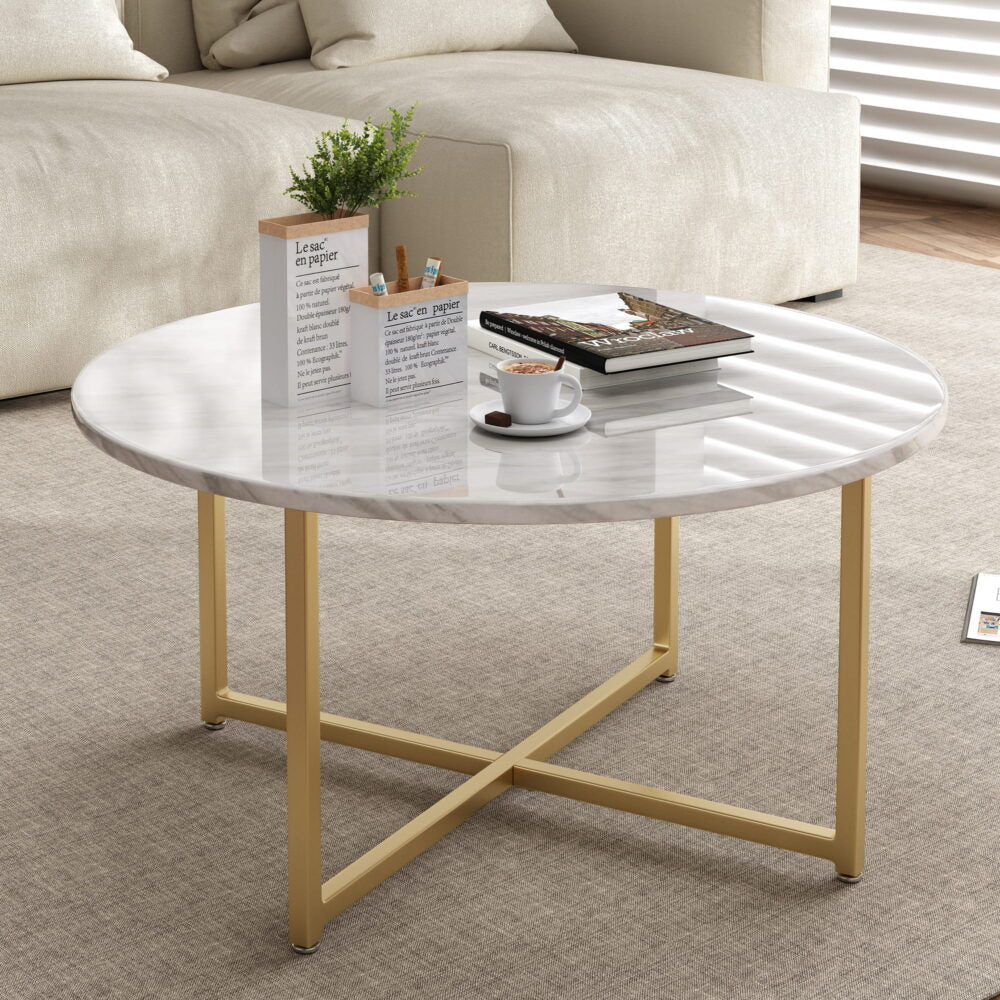Image of white marble effect round coffee table with gold legs ideal for luxury casual home interiors