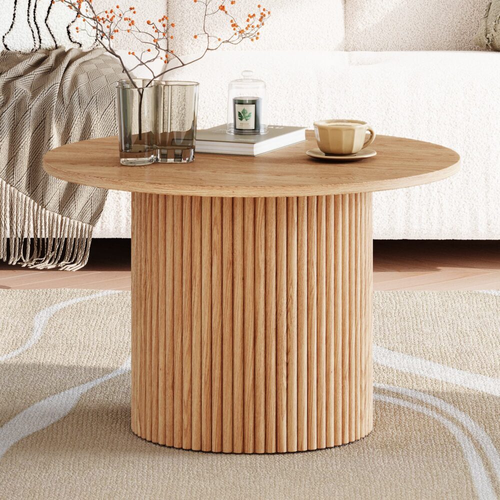 Image of luxe ribbed round coffee table wooden ideal for luxury casual home interiors