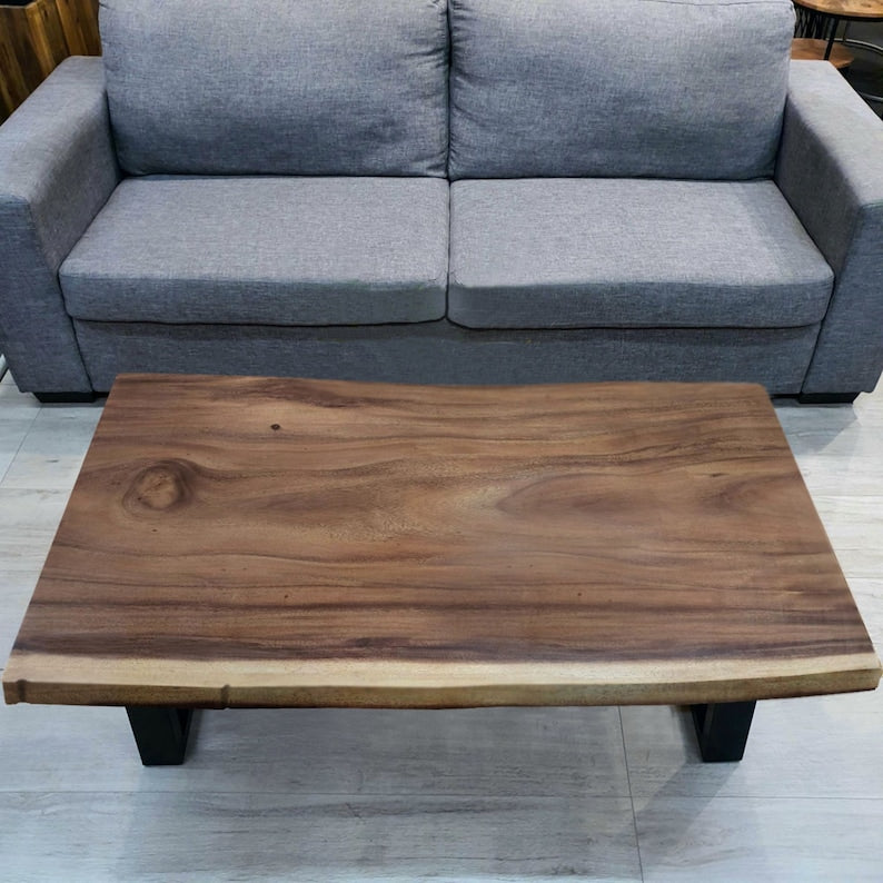 Image of coffee table 1.2m (120cm) hand carved from acacia tree (saur wood)- designed by nature. versatile for both home and professional use