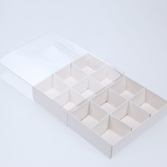 Image of 100 pack of white card chocolate sweet soap product retail gift box - 12 bay 4x4x3cm compartments - clear slide on lid - 16x12x3cm suitable for aged care, corporate offices, and commercial settings