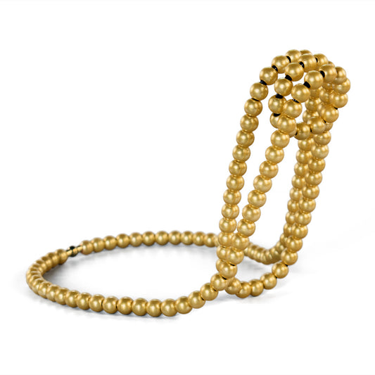 Image of gold modern floating pearl wine bottle holder  elegant home decor, unique kitchen accessory for dining, bar, and living room  ideal for luxury casual home interiors