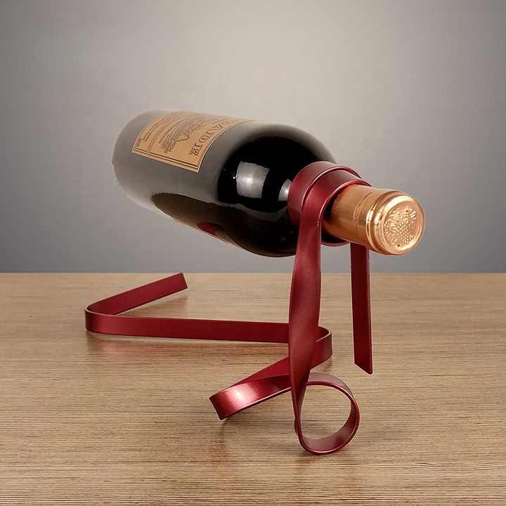 Image of red modern ribbon wine bottle holder - creative floating wine rack for home and bar dcor ideal for luxury casual home interiors