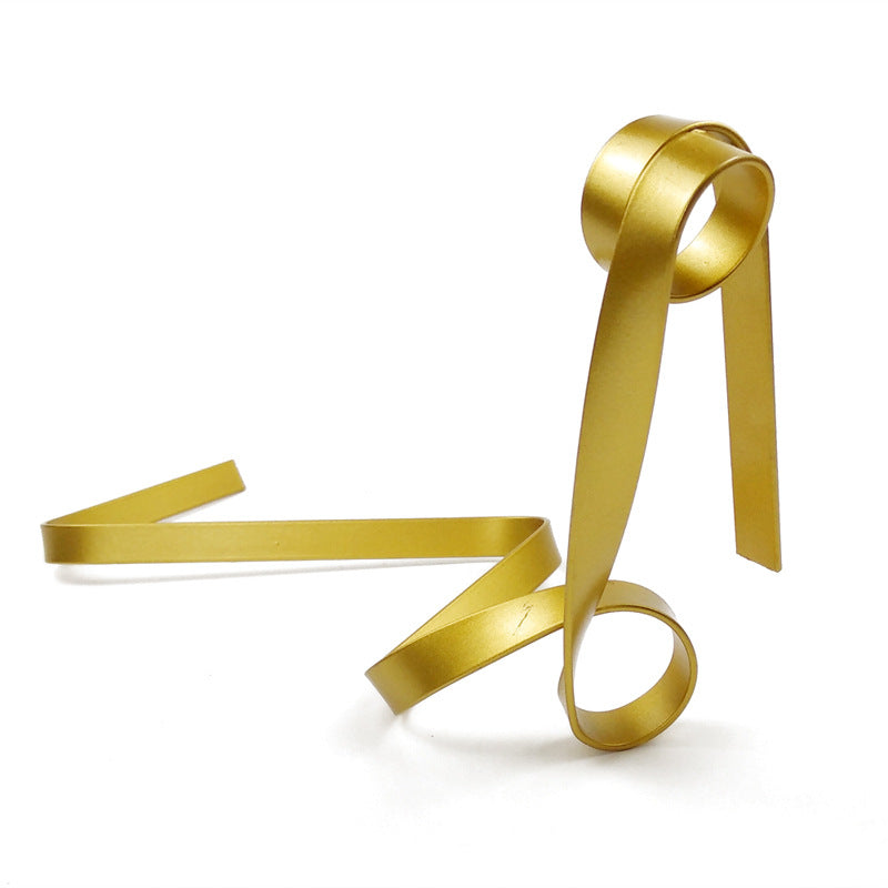 Image of gold modern ribbon wine bottle holder - creative floating wine rack for home and bar dcor  ideal for luxury casual home interiors