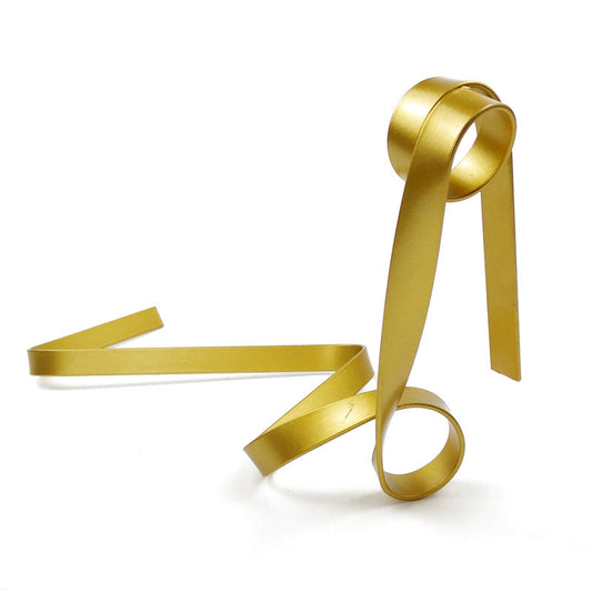 Image of gold modern ribbon wine bottle holder - creative floating wine rack for home and bar dcor  ideal for luxury casual home interiors