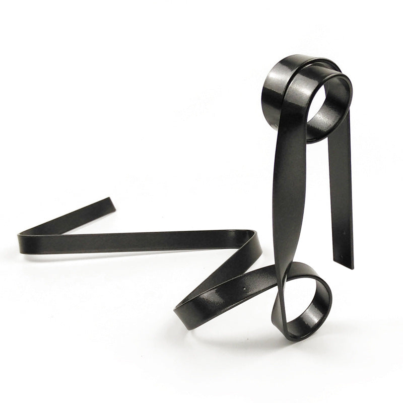 Image of black modern ribbon wine bottle holder - creative floating wine rack for home and bar dcor ideal for luxury casual home interiors
