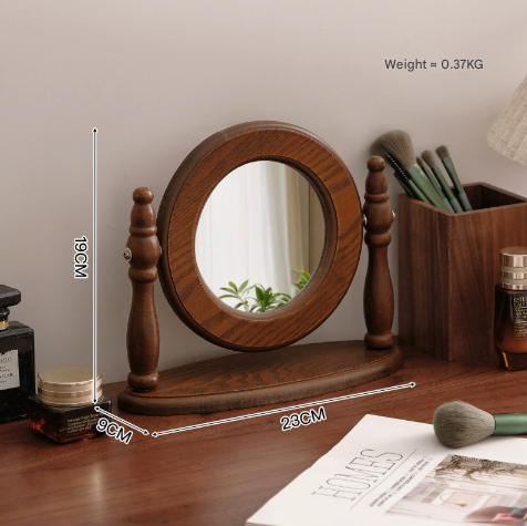 Image of rounded wooden tabletop vanity mirror, elegant design ideal for luxury casual home interiors