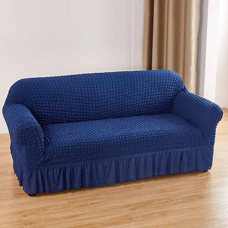 Image of navy blue single sofa bubble gauze sofa cover with skirt - full elastic dustproof single seater 90-140cm ideal for luxury casual home interiors
