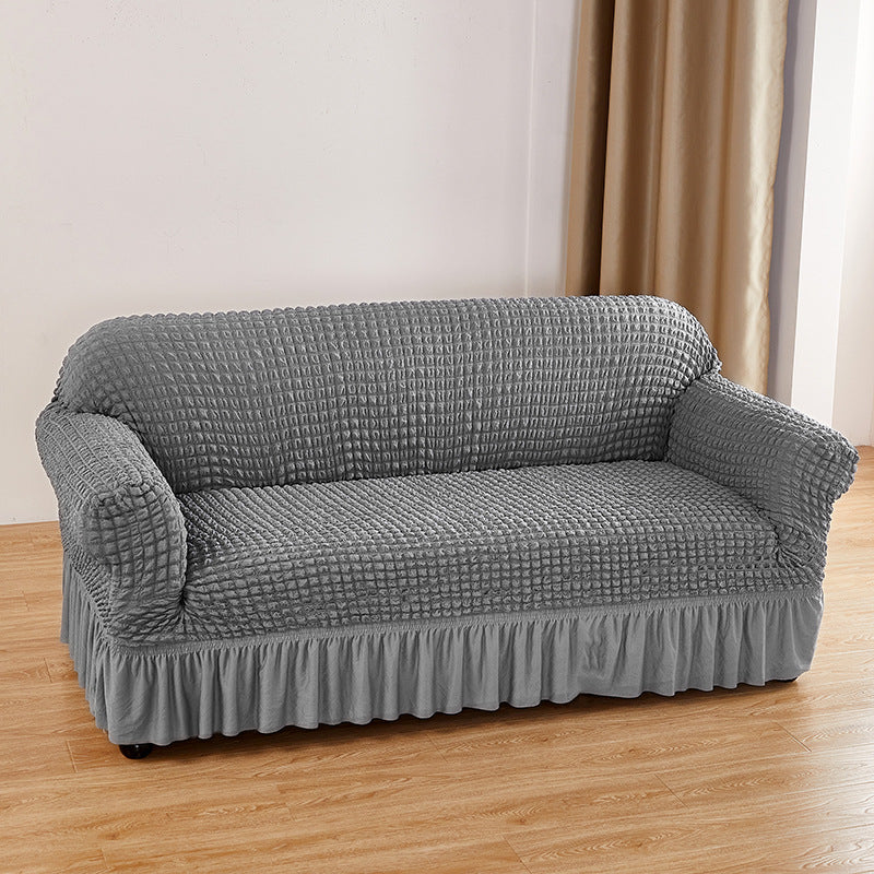 Image of silver-grey single sofa bubble gauze sofa cover with skirt - full elastic dustproof single seater 90-140cm ideal for luxury casual home interiors