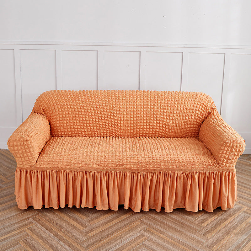 Image of orange double sofa bubble gauze sofa cover with skirt - full elastic dustproof double seater 145-185cm ideal for luxury casual home interiors