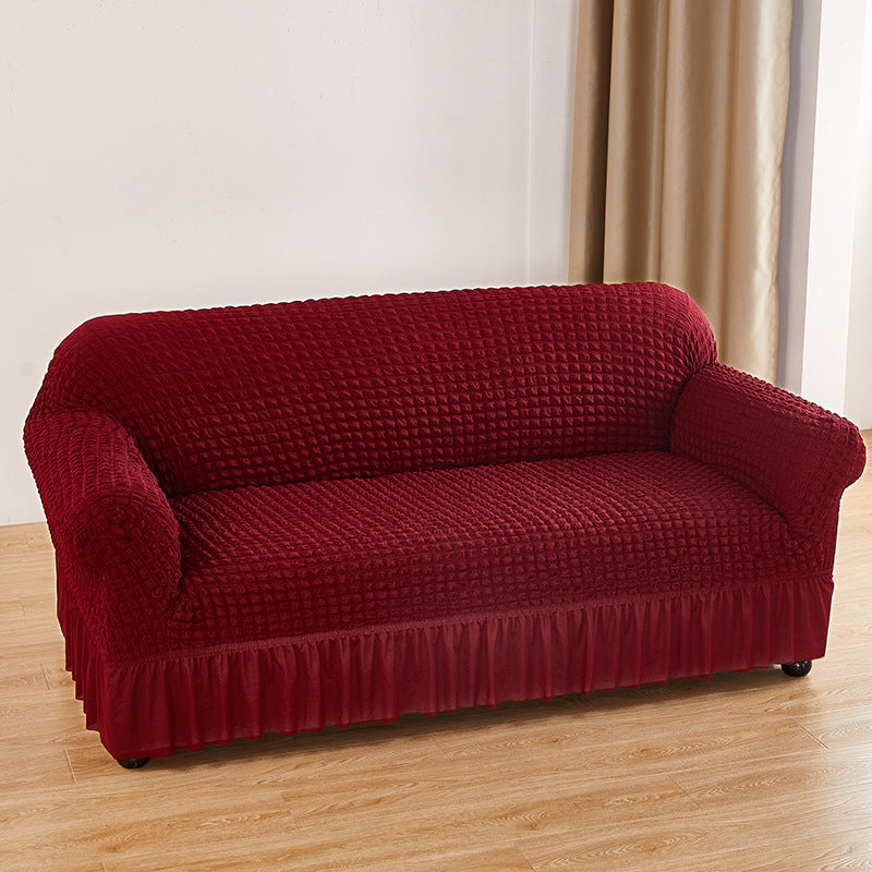 Image of wine-red double sofa bubble gauze sofa cover with skirt - full elastic dustproof double seater 145-185cm ideal for luxury casual home interiors