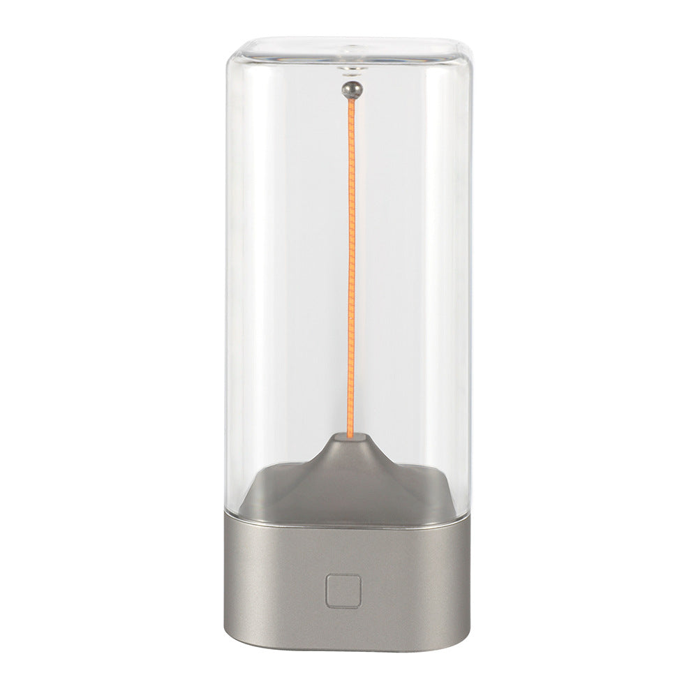 Image of silver portable magnetic table lamp with bendable led - usb-c rechargeable ideal for luxury casual home interiors