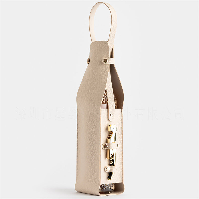 Image of beige leather-look single wine bottle carrier bag with handle and side pocket for opener(red wine and bottle opener are props for shooting and are not included) available at The Epic Shop