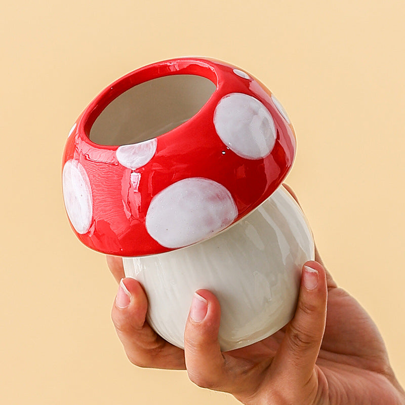 Image of red and white adorable ceramic mushroom desk organizer - cute pen & makeup brush holder suitable for aged care, corporate offices, and commercial settings