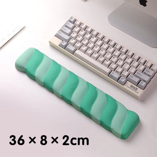 Image of green 2pcs ergonomic wavy keyboard wrist rest - comfortable typing support cushion  suitable for aged care, corporate offices, and commercial settings