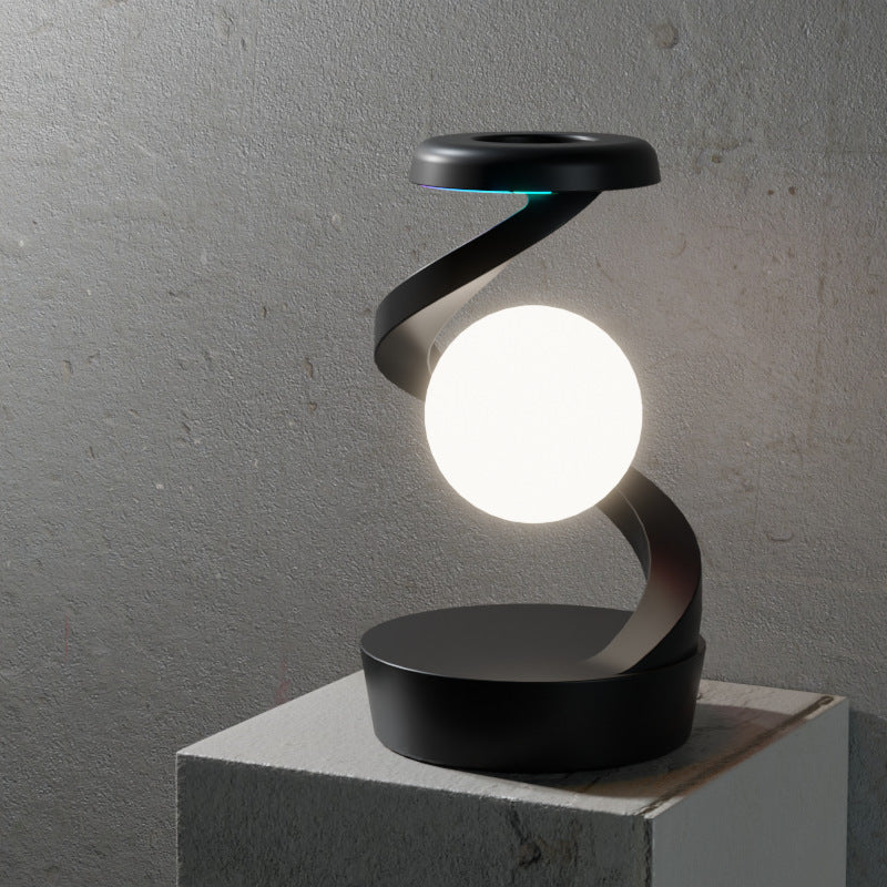 Image of black modern levitating led desk lamp - spiral design atmosphere light versatile for both home and professional use