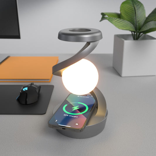 Image of grey-black modern levitating led desk lamp with wireless phone charger - spiral design atmosphere light  versatile for both home and professional use