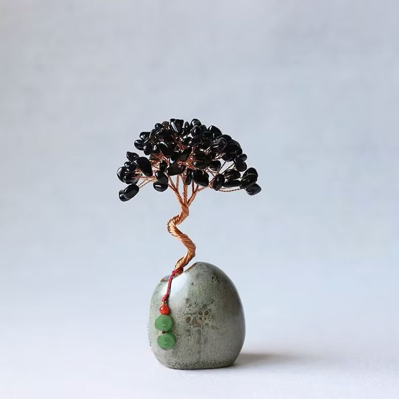 Image of black obsidian natural crystal wealth tree - 12cm feng shui decor, elegant office desk ornament suitable for aged care, corporate offices, and commercial settings