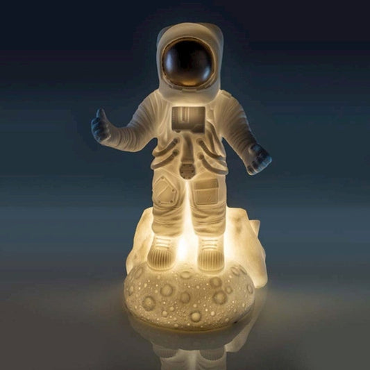 Image of astronaut table lamp  available at The Epic Shop
