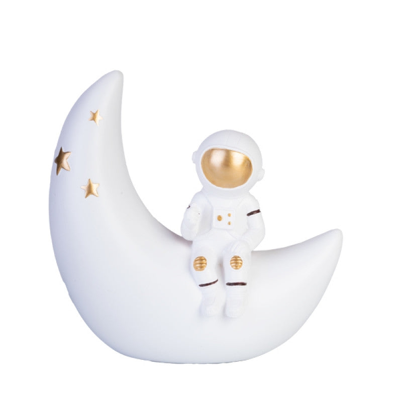 Image of moon astronaut table lamp  available at The Epic Shop