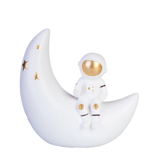 Image of moon astronaut table lamp  available at The Epic Shop