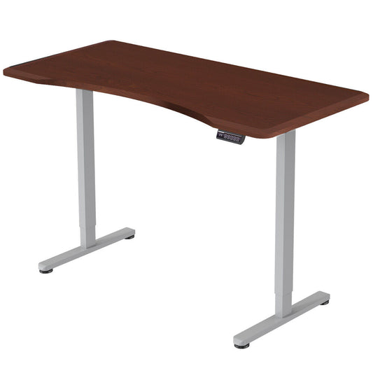Image of fortia sit to stand up standing desk, 150x75cm, 72-118cm electric height adjustable, ergonomically curved edge, 50kg rated, walnut style/silver frame  suitable for aged care, corporate offices, and commercial settings