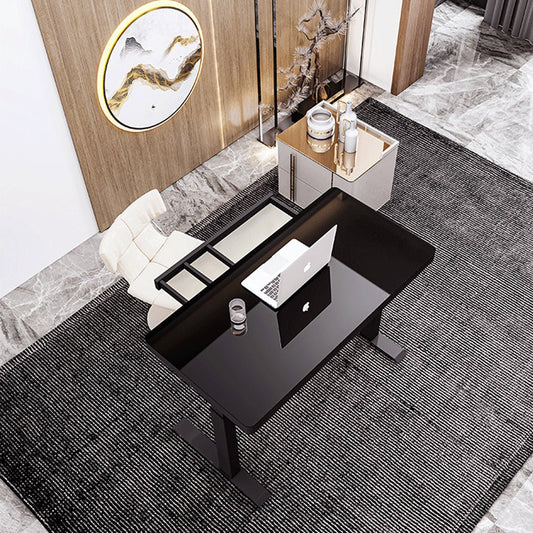 Image of black color electric standing desk electric height adjustable sit stand workstation toughened glass top single motor wireless charger  suitable for aged care, corporate offices, and commercial settings
