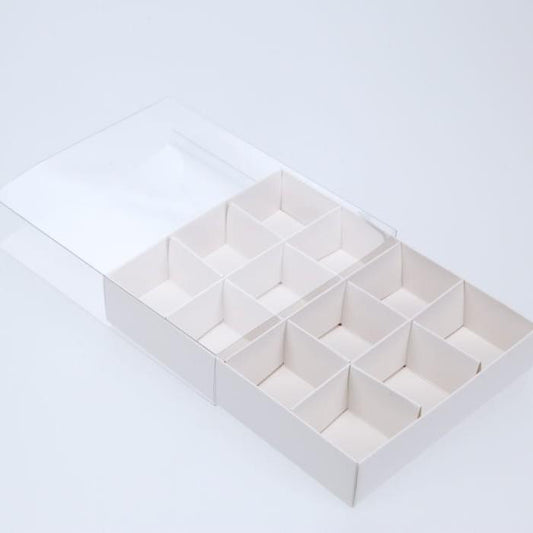 Image of 100 pack of white card chocolate sweet soap product retail gift box - 12 bay 4x4x3cm compartments  - clear slide on lid - 16x12x3cm  suitable for aged care, corporate offices, and commercial settings