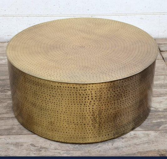 Image of hammered coffee table  ideal for luxury casual home interiors