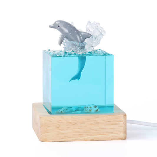Image of shell dolphin jumping handcrafted ocean resin whale night light - unique home decor table lamp  ideal for luxury casual home interiors