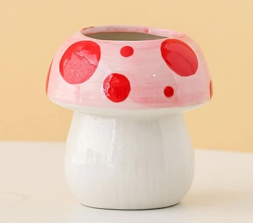 Image of pink and red adorable ceramic mushroom desk organizer - cute pen & makeup brush holder  suitable for aged care, corporate offices, and commercial settings