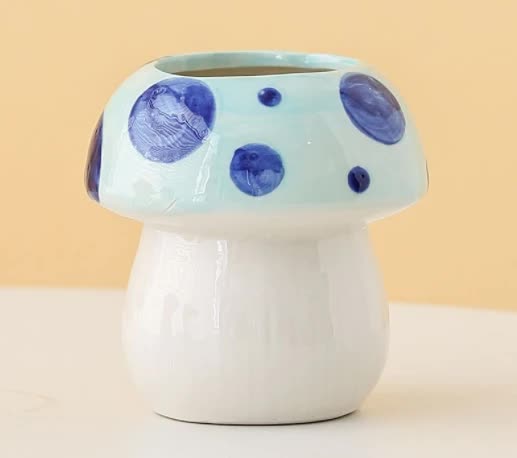 Image of blue adorable ceramic mushroom desk organizer - cute pen & makeup brush holder  suitable for aged care, corporate offices, and commercial settings