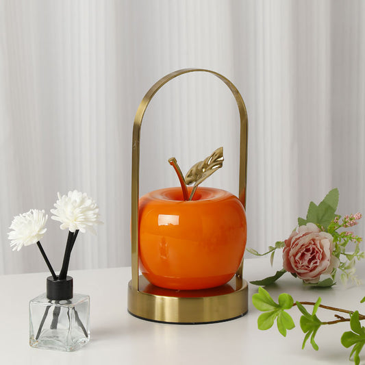 Image of orange decorative apple table lamp - usb-c,  3 light modes, metal handle  ideal for luxury casual home interiors
