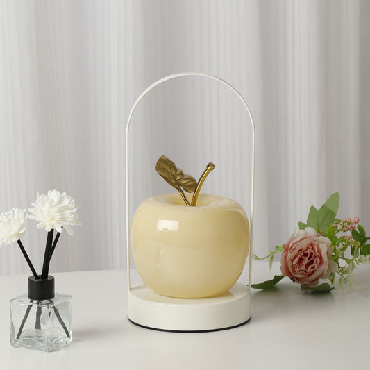 Image of yellow decorative apple table lamp - usb-c,  3 light modes, metal handle  ideal for luxury casual home interiors